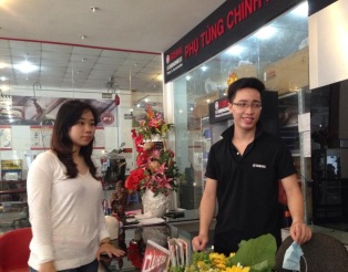 General Manager – Dai Thanh Tuan Anh at Yamaha Minh Ngoc Anh with an author